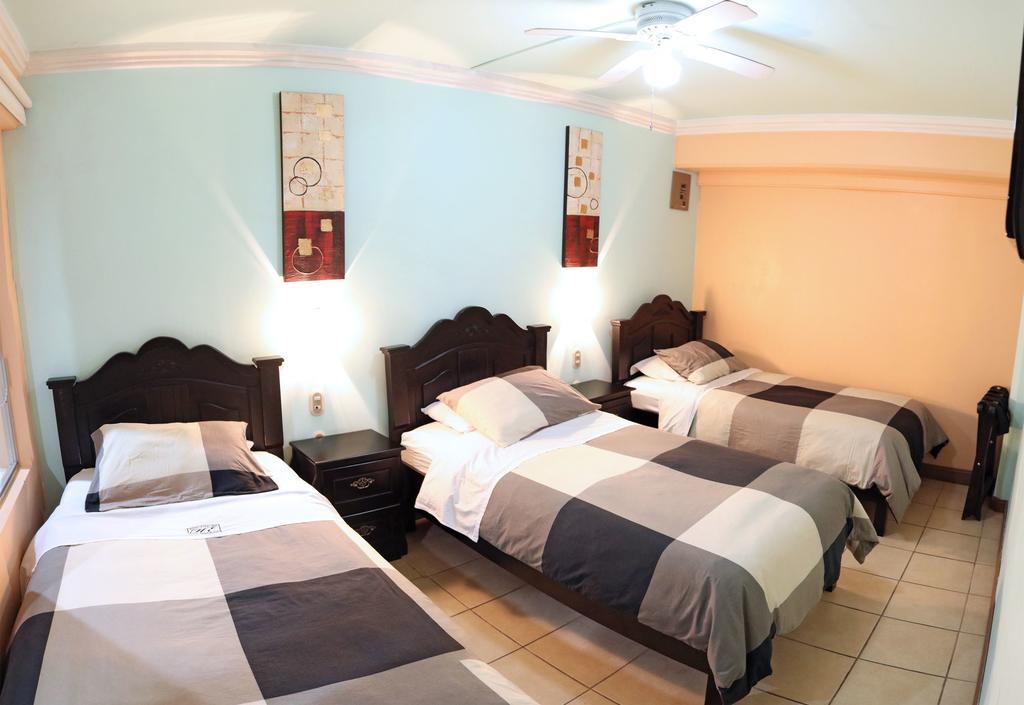 Hotel Eskalima Alajuela Bagian luar foto